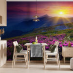 Fotótapéta Virágos mező, mögötte lenyugvó nap