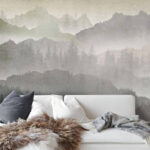 Fotótapéta Madarak repülnek egy hegyvonulat felett