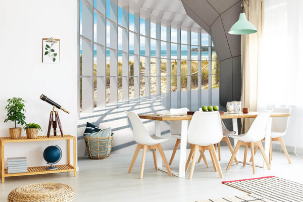 Fotótapéta Napfényes tengerparti kilátás a geometrikus ablakokon keresztül