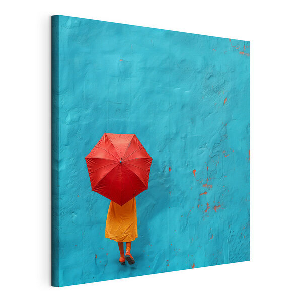 Vászonképek Egy piros esernyőt tartó személy