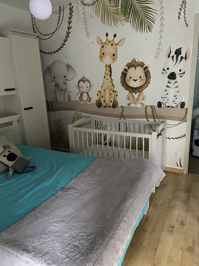 Fotótapéta Egy ágon ülő állatcsoport